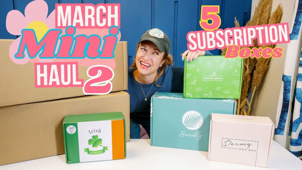 Person smiling beside five subscription boxes for a March haul.