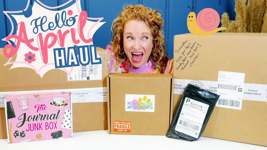 Excited woman surrounded by subscription boxes for April 2025 unboxing.